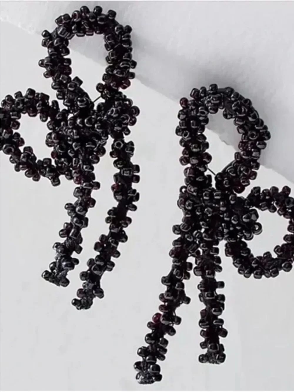 Free People Brandy Beaded Bow Dangle earrings in black